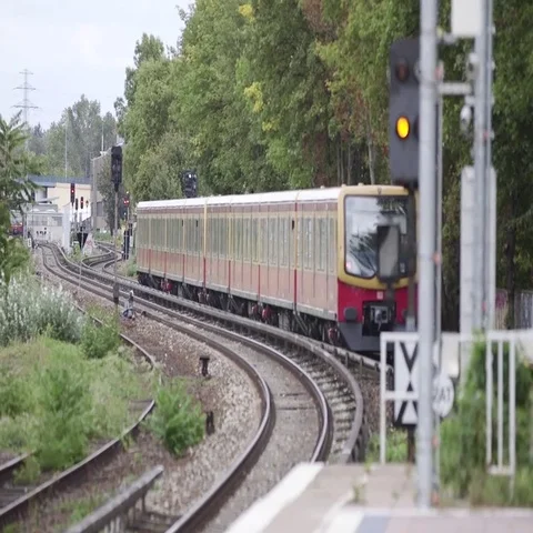 Train moving on railway track in Berlin city Stock Footage 69493507