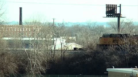 Train moving through the city. Stockbeeldmateriaal 10594585