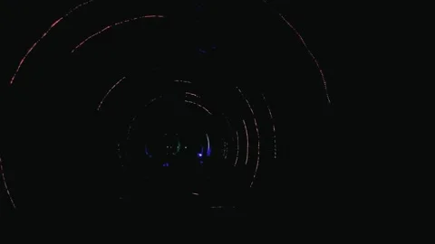 Train moving through tunnel with psychedelic lights animations at night in Sh Video stock 277648688