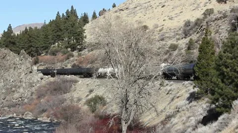 Train next to a river Stock Footage 10753339