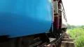Train on old railroad near Kwai river in Thailand HD Footage