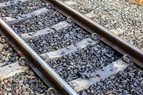 Train or railroad tracks with cement backing Stock Photos