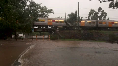 Train Over Bridge Kedron Brook Nundah | Brisbane Flood 2022 Australia Video stock 177751625