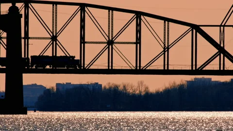 Train Over River Trestle Bridge 4K Stock Footage 150412340