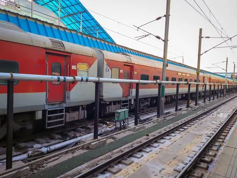 Train parked at platform with flat sky at morning from flat angle Фото