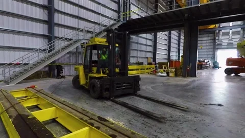 A train is parked on the side of a building Stock Footage 155537228