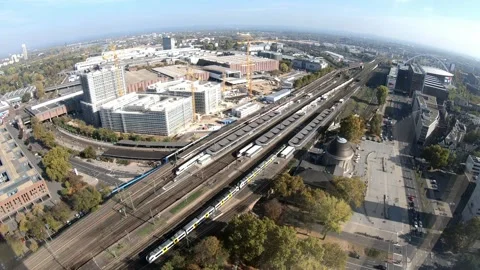 A train is parked on the tracks with graffiti on the side Stock Footage 313554468