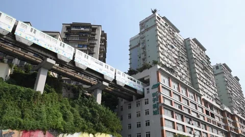 Train pass through building in Chongqing Vídeo Stock 237916203