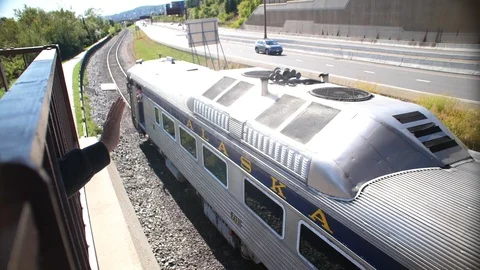 Train Passangers wave as they go by Slow Motion HD 24p Stock Footage 87805990