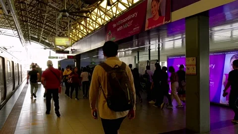 Train Passenger Alight on the Last Station of LRT Line 2 in Manila Philippines Stock Footage 236181768
