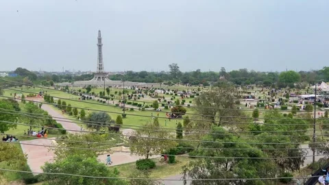 Train of passenger is moving in Lahore on April 14, 2024 Stock Footage 273068283