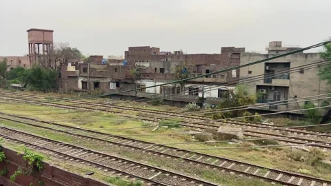 Train of passenger is moving in Lahore on April 14, 2024 Stock Footage 273081057