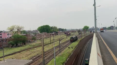 Train of passenger is moving in Lahore on April 14, 2024 Stock Footage 273085574