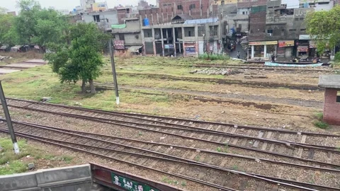 Train of passenger is moving in Lahore on April 14, 2024 Stock Footage 273085817