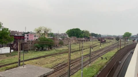 Train of passenger is moving in Lahore on April 14, 2024 Stock Footage 273089986