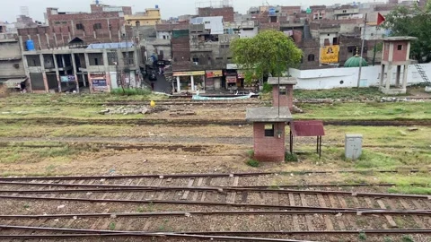 Train of passenger is moving in Lahore on April 14, 2024 Stock Footage 273090579
