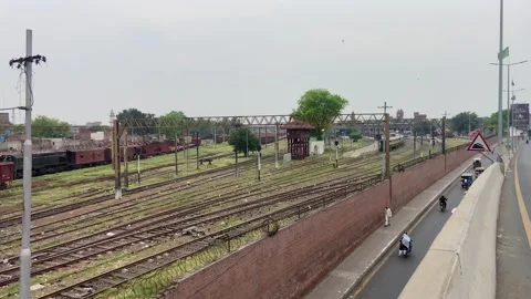 Train of passenger is moving in Lahore on April 14, 2024 Stock Footage 273092151