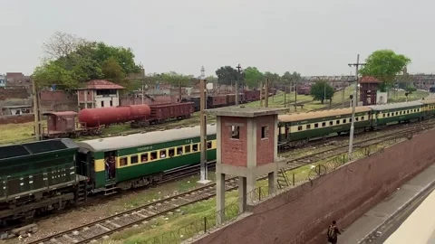 Train of passenger is moving in Lahore on April 14, 2024 Stock-Footage 273099185