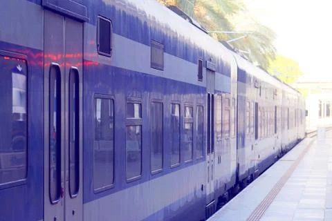 Train on a passenger platform Stock Photos