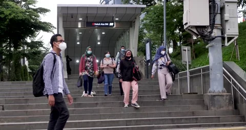 Train passengers are leaving the Sudirman station in Jakarta. Vídeo Stock 200077772