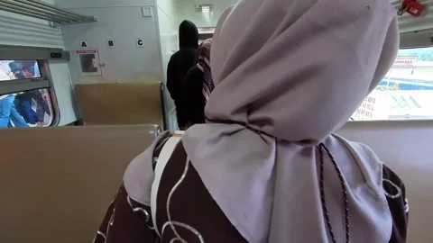 Train passengers crowding out of the train Stock Footage 332185883