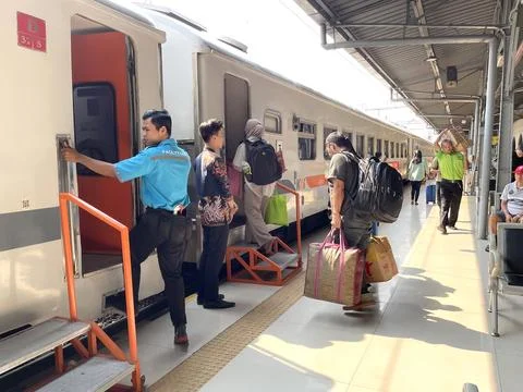 Train passengers will board and enter the train carriage  Stock Photos