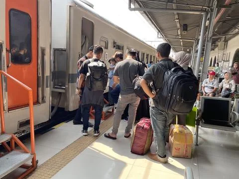 Train passengers will board and enter the train Stock Photos