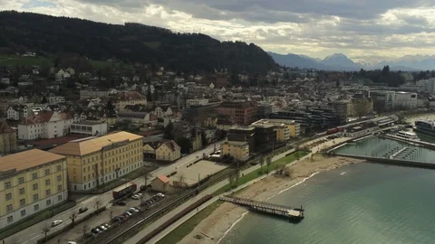 Train passes in Bregenz - Aerial 4K Stock Footage 126841495