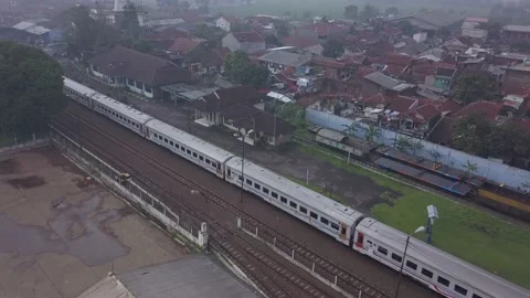 The train passes in the container area Stock Footage 236984865