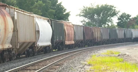 Train Passes on Curve - 4k Stock Footage 66912037