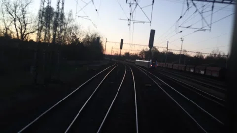Train passes on curved tracks Stock Footage 332620265