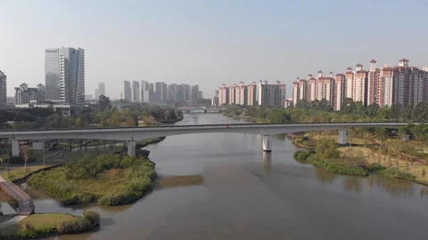 A train passes over an above ground subway bridge. Stock Footage 118288157