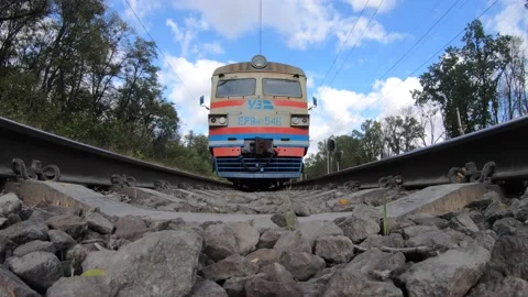 The train passes over the action camera. camera on sleepers between rails Stock Footage 141541660