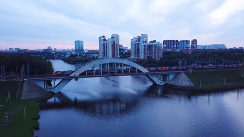 The train passes over the bridge over the Moscow channel Stock Footage 114769406