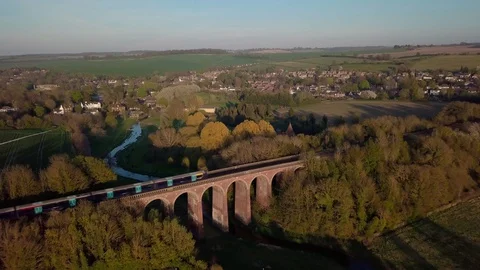 Train passes over Eynsford Viaduct, in Kent Countryside Stock Footage 128937654