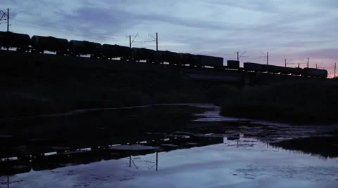 Train Passes Over The Railway Bridge, Silhouette Of Train Crossing Bridge Stock Footage