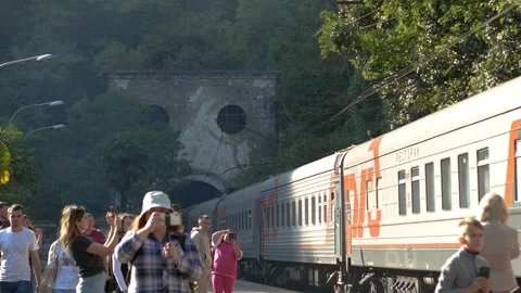 The train passes by the station Psyrtskha, New Athos Stock Footage 164256299