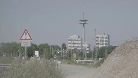 A train passes through a construction site Stockbeeldmateriaal 169328240