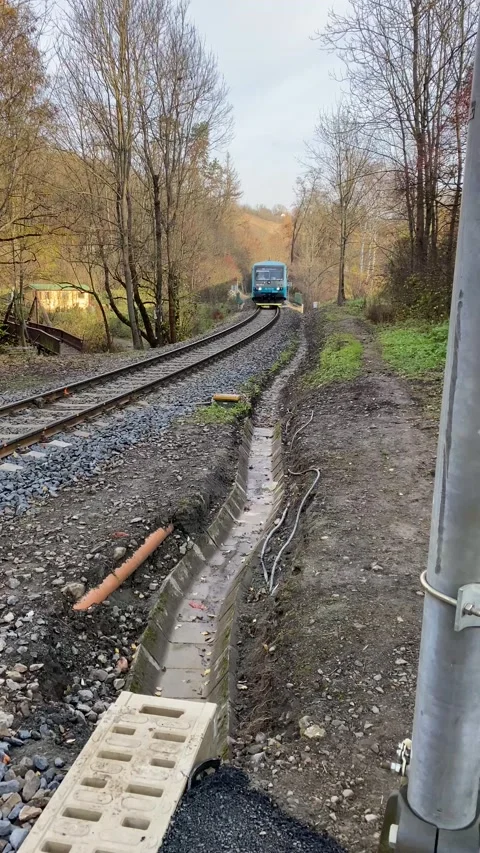 The train passes through the Prokopské valley in Prague Stock Footage 171889600