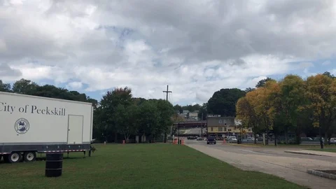 Train Passes Through a Small City on a Cloudy Day Stock Footage 102662393