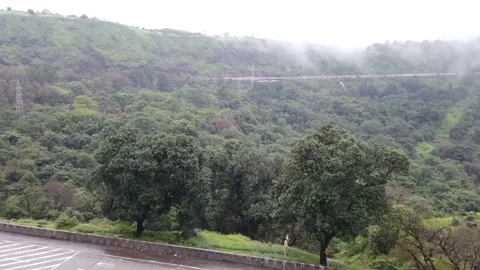 Train passes through Western Ghats Video stock 140989701