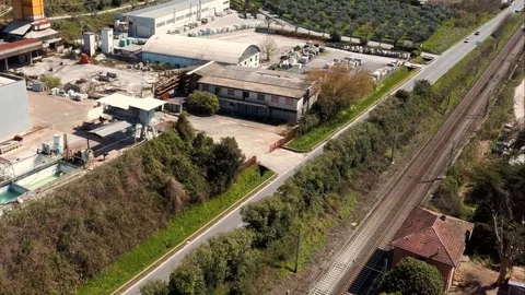 Train passes on the tracks seen from above Stock Footage 128819314