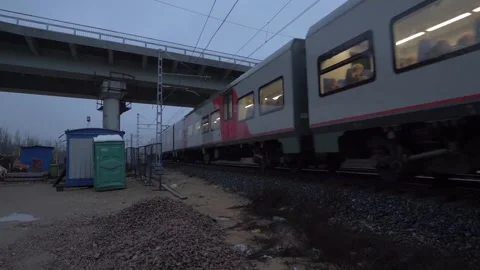 A train passes under a bridge, railway Stock Footage 300871084