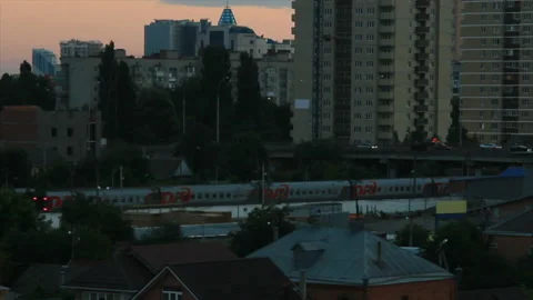 The train passes under the city bridge Video stock 150446856