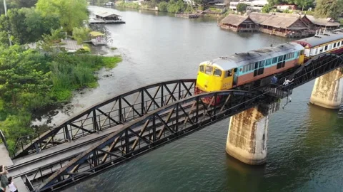 Train passig through the River Kwai Bridge Stock Footage 194445824