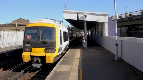 Train passing by and traveller entering the wagon Stock Footage 197442804