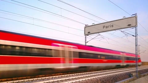 Train passing below paris station signboard 動画素材 103089051