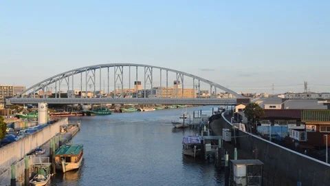 Train passing on a bridge by the port 動画素材 127032136
