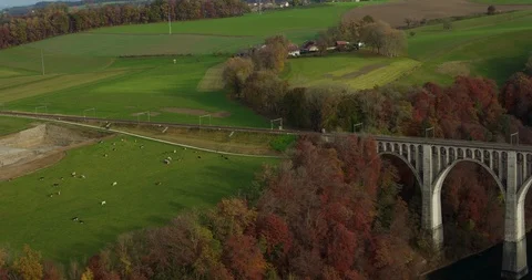 Train passing bridge Viaduc de Grandfey Video stock 120313868