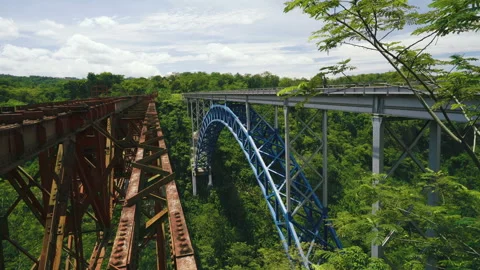 Train passing bridge in West Java, Indonesia Video stock 85690056